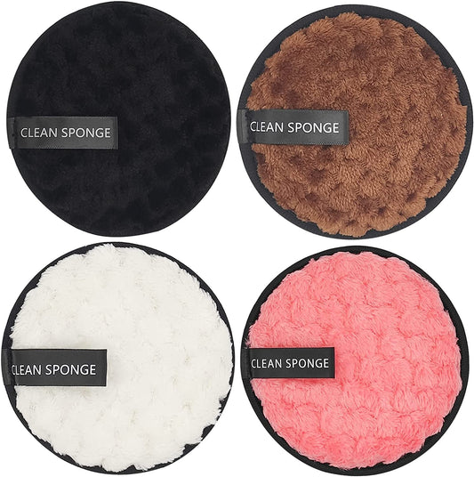 Set of four reusable soft makeup remover pads in black, brown, white, and pink microfiber face rounds with "CLEAN SPONGE" label
